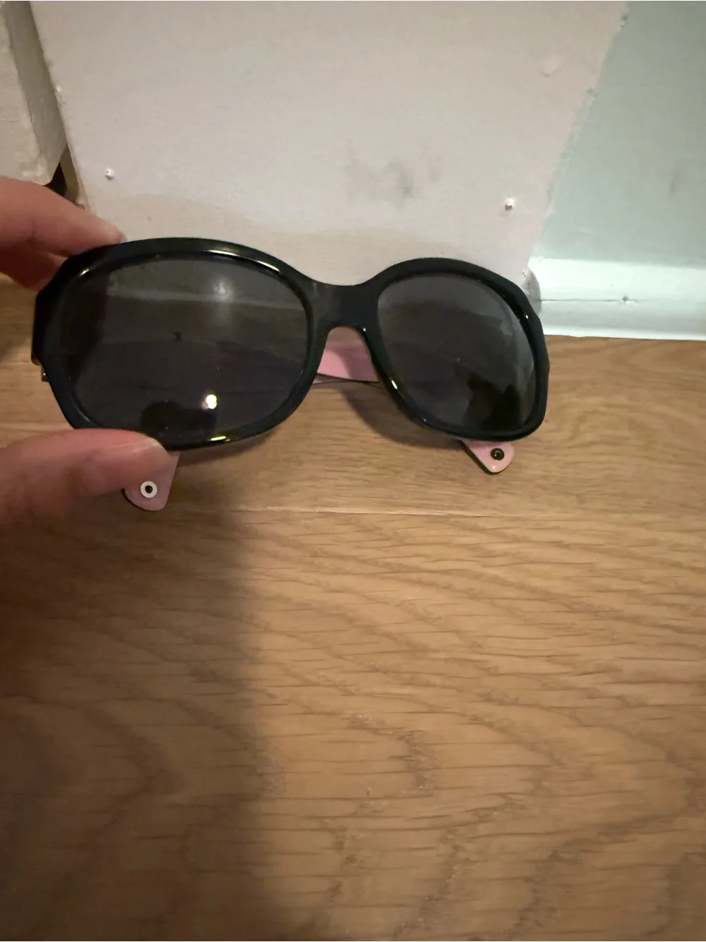 Coach “Emma” Black Logo-Accent Sunglasses with Gold and Pink Details